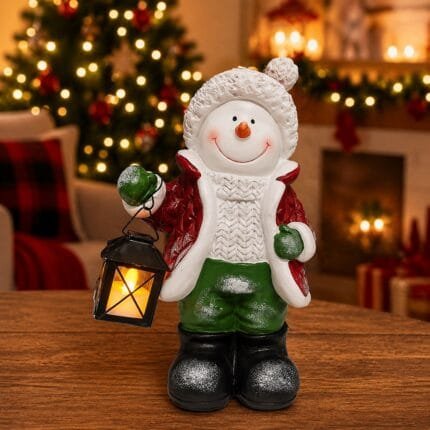 Boneco de neve em resina com lamparina iluminada, ideal para decoração natalina.