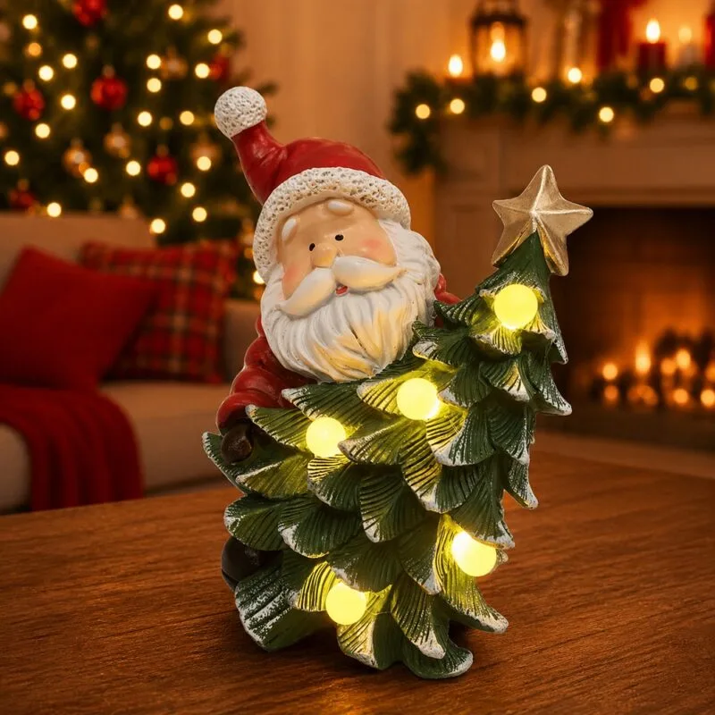 Papai Noel em resina com árvore de Natal com LED, ideal para decoração encantadora.