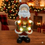 Papai Noel em resina segurando guirlanda iluminada, ideal para decoração natalina sofisticada.