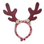 Tiara de rena natalina com chifres, botões decorativos e acabamento costurado estilo farm house. Mede aproximadamente 26x25cm.