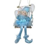 Fada Natalina Musical no Balanço com aproximadamente 70 cm de comprimento, ideal para compor decorações natalinas elegantes.