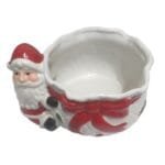 Doceira decorativa de Natal em cerâmica com Papai Noel abraçando o vaso, ideal para servir doces e decorar mesas natalinas.