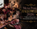 Mesa posta elegante para Halloween 2026, com louças pretas, taças em tons de vinho, talheres dourados, flores burgundy, velas, abóboras decorativas, morcegos e detalhes sofisticados em uma atmosfera aconchegante e misteriosa.