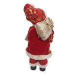Papai Noel decorativo musical com chave de corda nas costas, movimento de cabeça e roupas detalhadas em tecido premium.