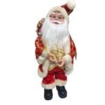 Papai Noel decorativo musical com chave de corda nas costas, movimento de cabeça e roupas detalhadas em tecido premium.