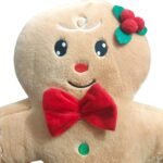 Almofada Gingerbread com indicação das medidas aproximadas de 42 cm de comprimento, 30 cm de largura e 12 cm de espessura.
